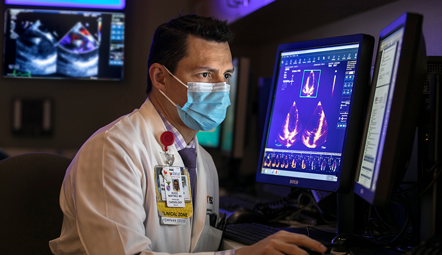 Dr. Martinez reads a patients echocardiogram.